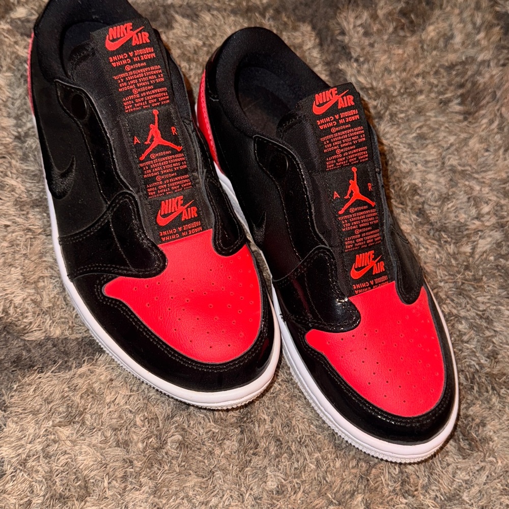 Nike Air Jordan 1 Black and Red Athletic Shoes
